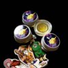 Fresh press rosin Zkittlez dab on tool, golden amber color