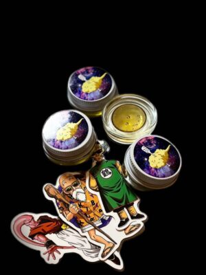 Fresh press rosin Zkittlez dab on tool, golden amber color