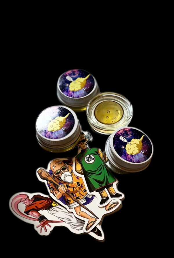 Fresh press rosin Zkittlez dab on tool, golden amber color